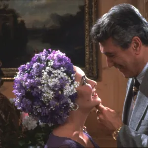 Elizabeth Taylor and Rock Hudson in a scene from The Mirror Crack d (1980)