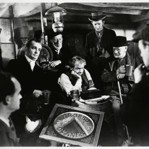 An interior group scene from The Last Days of Dolwyn (1949)