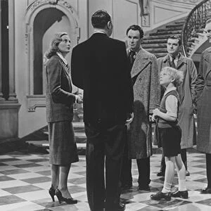 An interior group scene from The Fallen Idol (1948)