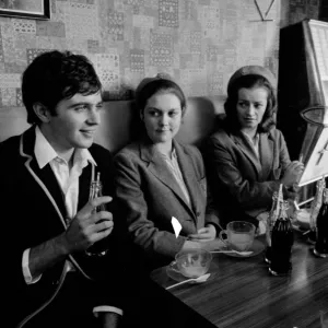 Jim Maclaine with a soft drink and friends