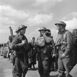 John Mills as Corporal Tubby Bins