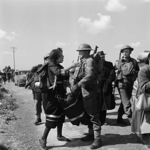 John Mills as Corporal Tubby Bins