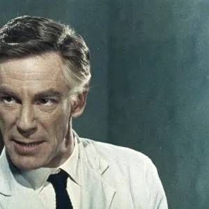 Michael Gough as Dr. Decker