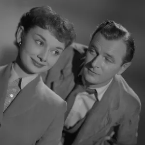 Nigel Patrick looks at Audrey Hepburn in a portrait for Young Wives Tale (1951)