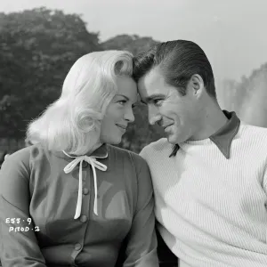 A portrait of Diana Dors and Michael Craig