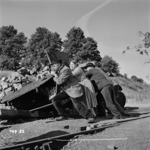 Pushing the truck off the tracks