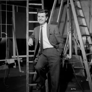 A smiling Rodney Bewes on the set of Billy Liar (1963)