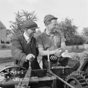 A smiling Sid James