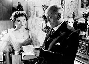 Images Dated 9th January 2014: Alastair Sim and Eileen Moore in a scene from An Inspector Calls (1954)