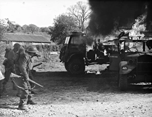 World Prints: Army vehicles on fire