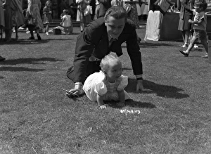 <b class=qtipBold><figcaption>Brighton Rock (1947)</figcaption></b><br>A playful publicity shot of Richard Attenborough with a baby.<br><em>© Copyright © Studiocanal Films Ltd</em> Brighton Rock (1947)