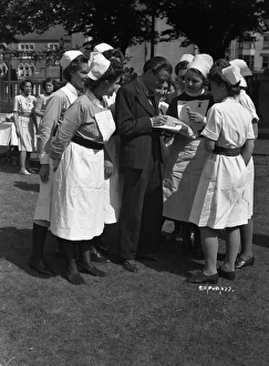 <b class=qtipBold><figcaption>Brighton Rock (1947) publicity</figcaption></b><br>Richard Attenborough entertains a group of nurses during the promotion of the release of Brighton Rock.<br><em>© Copyright © Studiocanal Films Ltd</em> Brighton Rock (1947) publicity