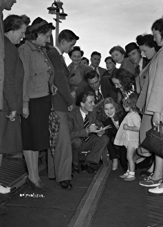 <b class=qtipBold><figcaption>Brighton Rock (1947) publicity</figcaption></b><br>Richard Attenborough with fans during the filming of Brighton Rock.<br><em>© Copyright © Studiocanal Films Ltd</em> Brighton Rock (1947) publicity