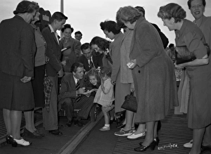 <b class=qtipBold><figcaption>Brighton Rock (1947) publicity</figcaption></b><br>Richard Attenborough with fans to promote the film.<br><em>© Copyright © Studiocanal Films Ltd</em> Brighton Rock (1947) publicity
