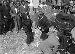 <b class=qtipBold><figcaption>Brighton Rock (1947) publicity</figcaption></b><br>Filming the slashing of Spicer sequence at Brighton racecourse.<br><em>© Copyright © Studiocanal Films Ltd</em> Brighton Rock (1947) publicity