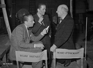 <b class=qtipBold><figcaption>Brighton Rock</figcaption></b><br>Richard Attenborough shows his fake scar to a visitor on set for Brighton Rock as William Hartnell looks on.<br><em>© Copyright © Studiocanal Films Ltd</em> Brighton Rock