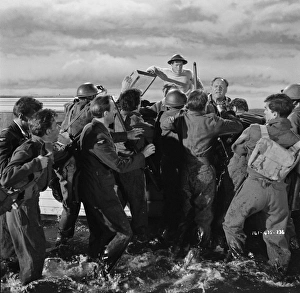British soldiers in the water waiting to be rescued