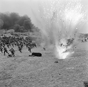 British troops under bombardment on the beach