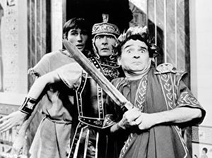 <b class=qtipBold><figcaption>Carry On Cleo (1964)</figcaption></b><br>Jim Dale as Horsa, Kenneth Williams as Julius Caesar and Kenneth Connor as Hengist Pod in a classic Carry On pose.<br><em>© Copyright © Studiocanal Films Ltd</em> Carry On Cleo (1964)
