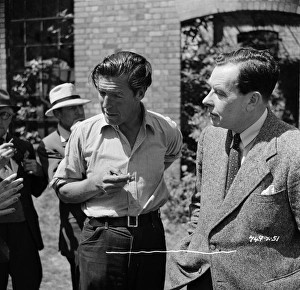Charles Crichton and T. E B. Clarke