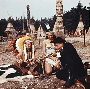 Charles Hawtrey, Sally Douglas and Sid James in a scene from Carry On Cowboy