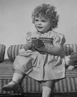 Portraits Collection: Child with Toy Boat publicity shot for Young Wives Tale