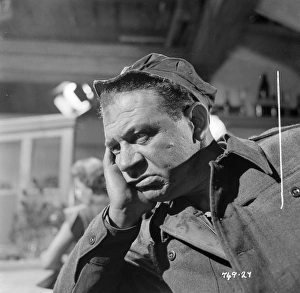 A close up of Sid James