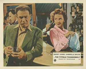 A colour lobby card for The Titfield Thunderbolt