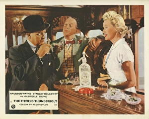 A colour lobby card for The Titfield Thunderbolt