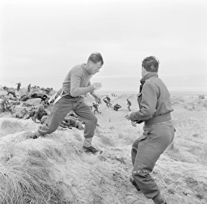 Bombardment Prints: Corporal Tubby Bins runs on the beach