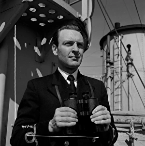 <b class=qtipBold><figcaption>The Cruel Sea (1953)</figcaption></b><br>Donald Sinden in a portrait for Charles Frend's war drama.<br><em>© Copyright © Studiocanal Films Ltd</em> The Cruel Sea (1953)