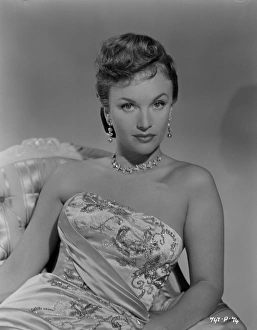 <b class=qtipBold><figcaption>The Cruel Sea (1953)</figcaption></b><br>A glamorous promotional portrait of Moira Lister<br><em>© Copyright © Studiocanal Films Ltd</em> The Cruel Sea (1953)