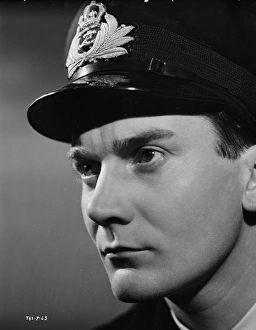 <b class=qtipBold><figcaption>The Cruel Sea (1953)</figcaption></b><br>A publicity portrait of Denholm Elliott for the release of The Cruel Sea.<br><em>© Copyright © Studiocanal Films Ltd</em> The Cruel Sea (1953)