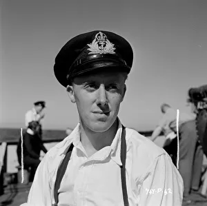 <b class=qtipBold><figcaption>The Cruel Sea (1953)</figcaption></b><br>Dafydd Havard on location for The Cruel Sea.<br><em>© Copyright © Studiocanal Films Ltd</em> The Cruel Sea (1953)