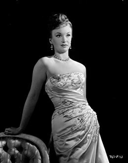<b class=qtipBold><figcaption>The Cruel Sea (1953)</figcaption></b><br>A publicity portrait of a glamorous Moira Lister for the release of The Cruel Sea.<br><em>© Copyright © Studiocanal Films Ltd</em> The Cruel Sea (1953)