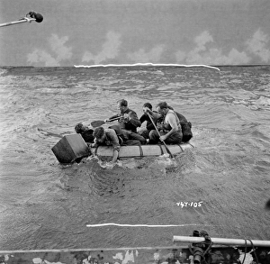<b class=qtipBold><figcaption>The Cruel Sea (1953)</figcaption></b><br>On the tank at Ealing Studios filming a lifeboat sequence for Charles Frend's classic war film.<br><em>© Copyright © Studiocanal Films Ltd</em> The Cruel Sea (1953)