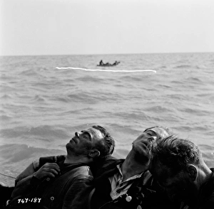 <b class=qtipBold><figcaption>The Cruel Sea (1953)</figcaption></b><br>A scene of a rescue boat with British sailors at sea from The Cruel Sea.<br><em>© Copyright © Studiocanal Films Ltd</em> The Cruel Sea (1953)