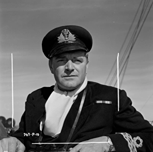 <b class=qtipBold><figcaption>The Cruel Sea (1953)</figcaption></b><br>An intense portrait of Jack Hawkins on location.<br><em>© Copyright © Studiocanal Films Ltd</em> The Cruel Sea (1953)