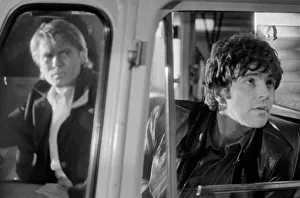 David Essex as Jim and Adam Faith as Mike