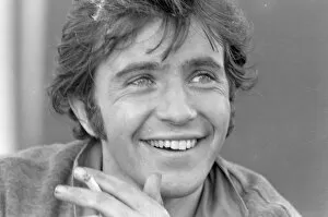 Black And White Collection: David Essex smiling and with cigarette in his hand