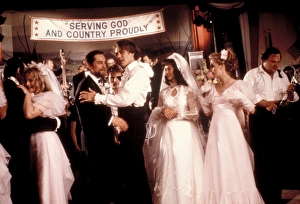 <b class=qtipBold><figcaption>The Deer Hunter</figcaption></b><br>Group shot of the cast of The Deer Hunter during the wedding sequence.<br><em>© Copyright Studiocanal Films Ltd</em> The Deer Hunter