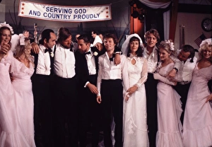 <b class=qtipBold><figcaption>The Deer Hunter</figcaption></b><br>Group shot of the cast of The Deer Hunter during the wedding sequence.<br><em>© Copyright Studiocanal Films Ltd</em> The Deer Hunter
