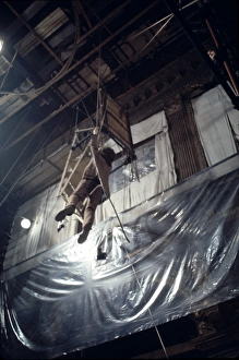 Colour Image Prints: Donald Sutherland dangles from a rope in a scene from Don t Look Now (1973)