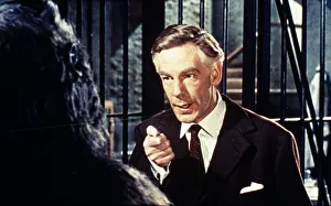 <b class=qtipBold><figcaption>Dr. Decker talks to Konga</figcaption></b><br>Michael Gough in a scene from Konga (1961)<br><em>© Copyright Studiocanal Films Ltd</em> Dr. Decker talks to Konga