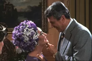 Images Dated 4th November 2015: Elizabeth Taylor and Rock Hudson in a scene from The Mirror Crack d (1980)