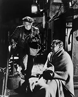 The engineer and The American in a scene from The Maggie (1954) The engineer and The American in a scene from The Maggie (1954)