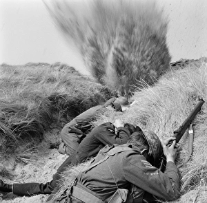 An explosion in a scene from Dunkirk (1958)