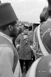 <b class=qtipBold><figcaption>Filming Billy Liar</figcaption></b><br>John Schlesinger oversees the set-up of a crowd scene during the filming of his film Billy Liar in 1963.<br><em>© Copyright © Studiocanal Films Ltd</em> Filming Billy Liar