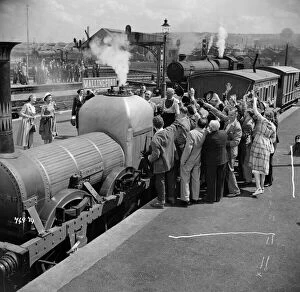 Exteriors Collection: A group scene from The Titfield Thunderbolt
