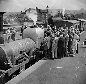 A group scene from The Titfield Thunderbolt